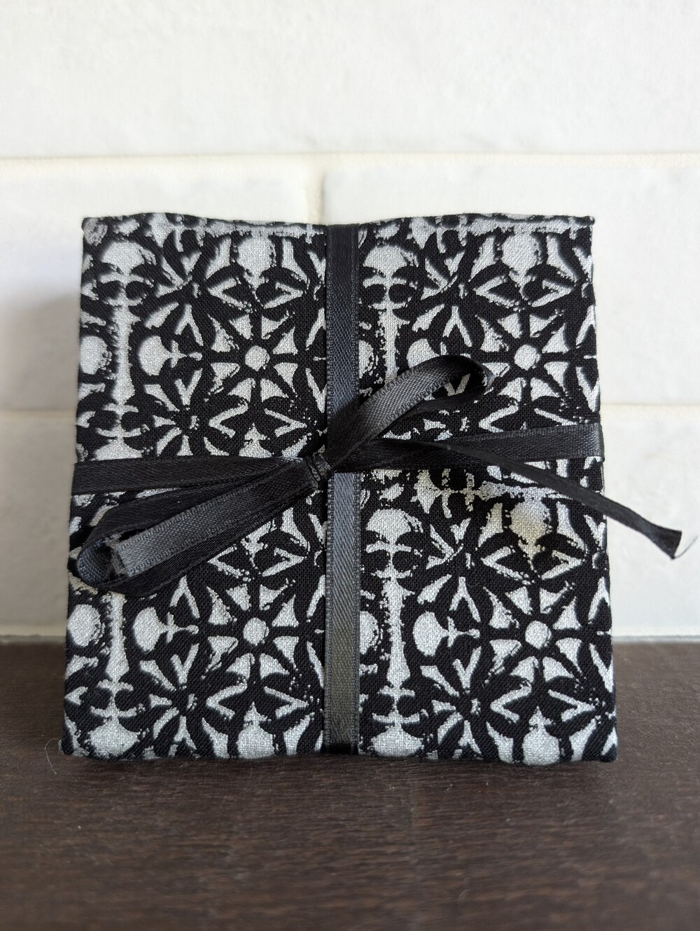 Set Of Four Handmade Fabric Covered Coasters In Silver Black Print